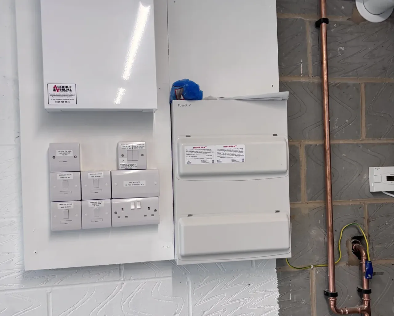 New consumer unit fitted alongside heating and alarm controls